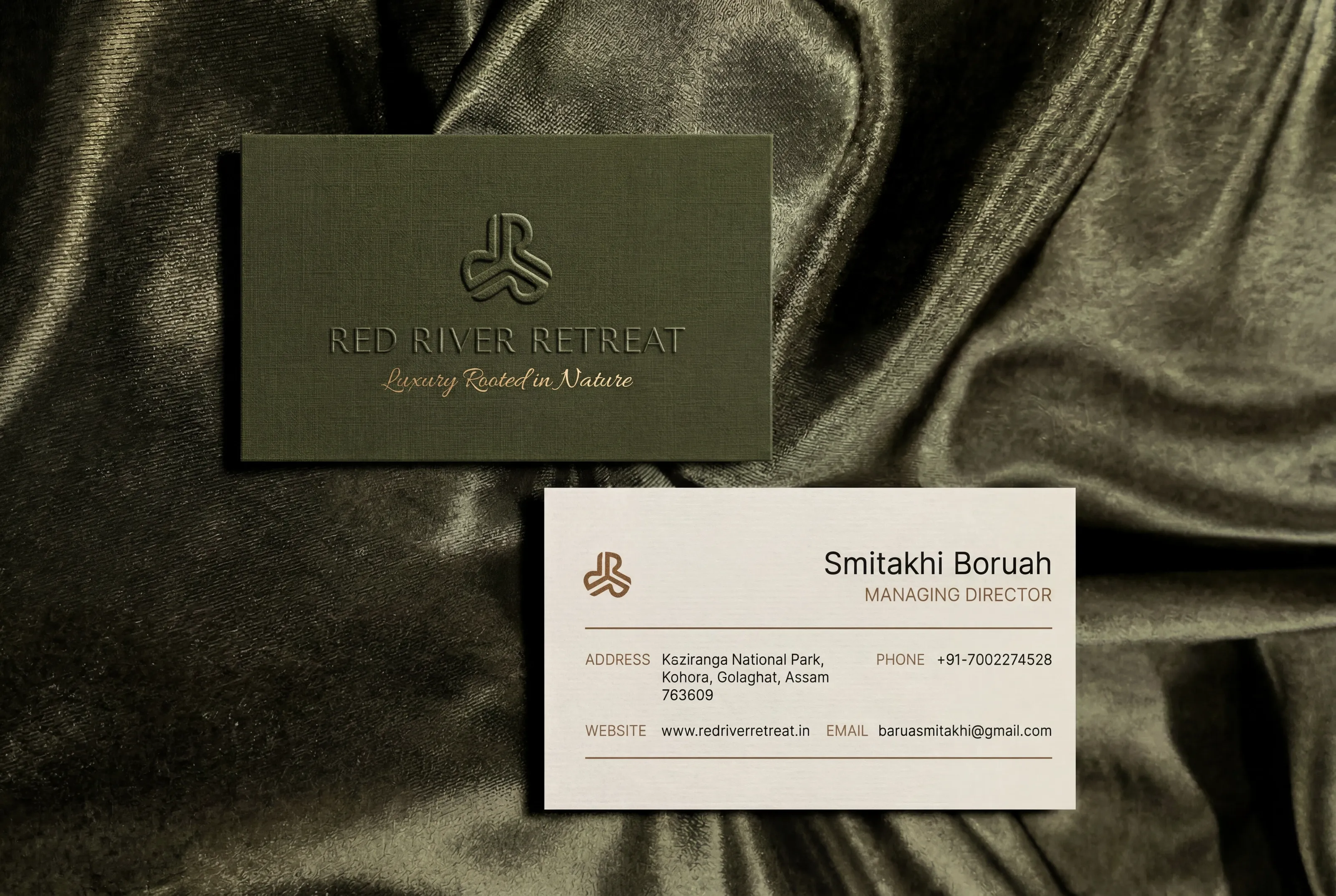 Foil-stamped business cards on olive linen stock
